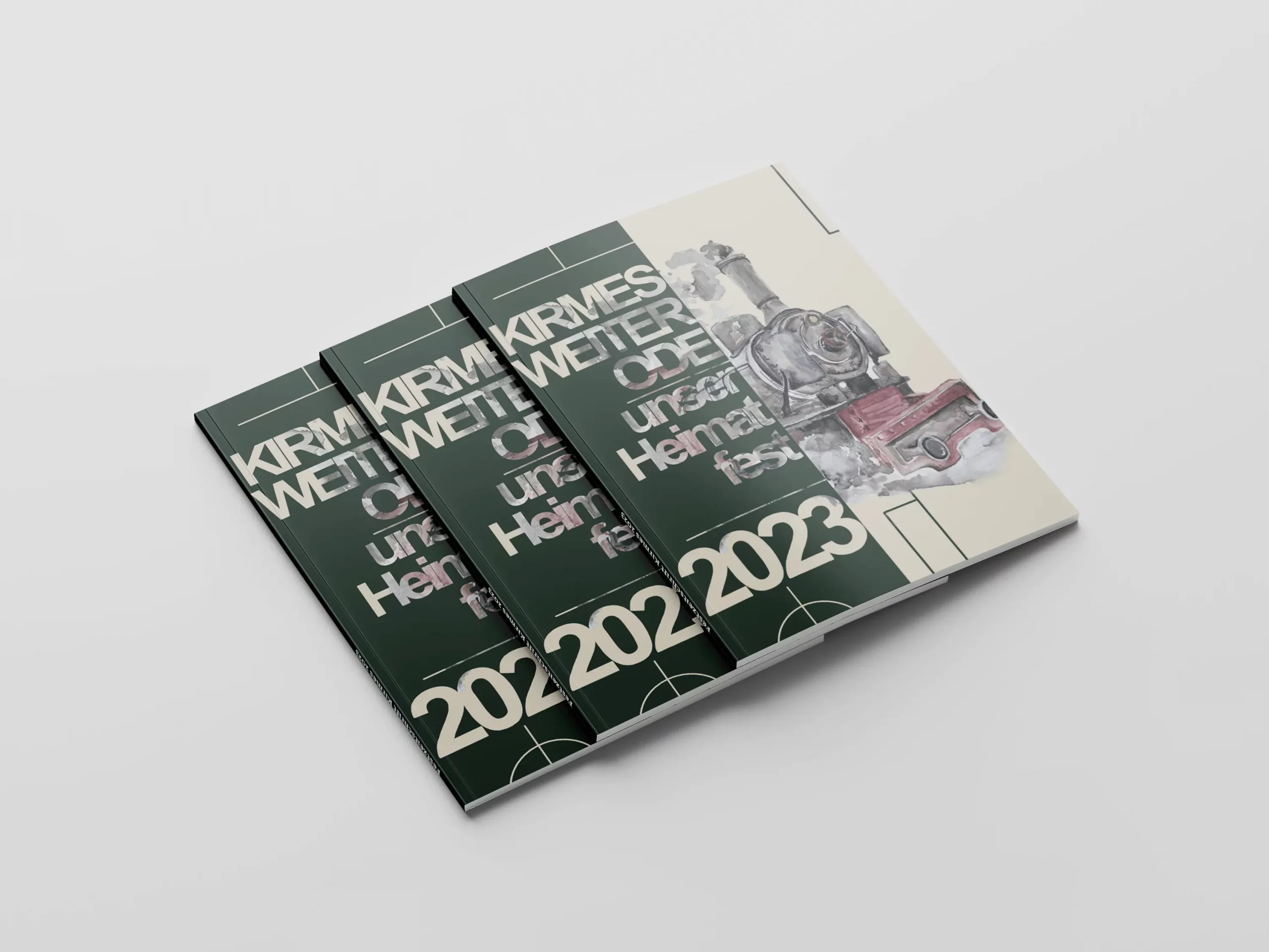 Drei Exemplare der Festzeitschrift „Kirmes Weiterode – Unser Heimatfest 2023“ auf weißem Hintergrund.
